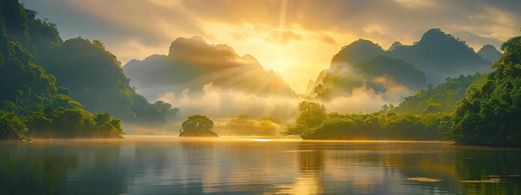 a breathtaking sunrise casts golden hues over a serene, mist-covered lake surrounded by towering, lush green mountains, embodying tranquility and the beauty of nature.