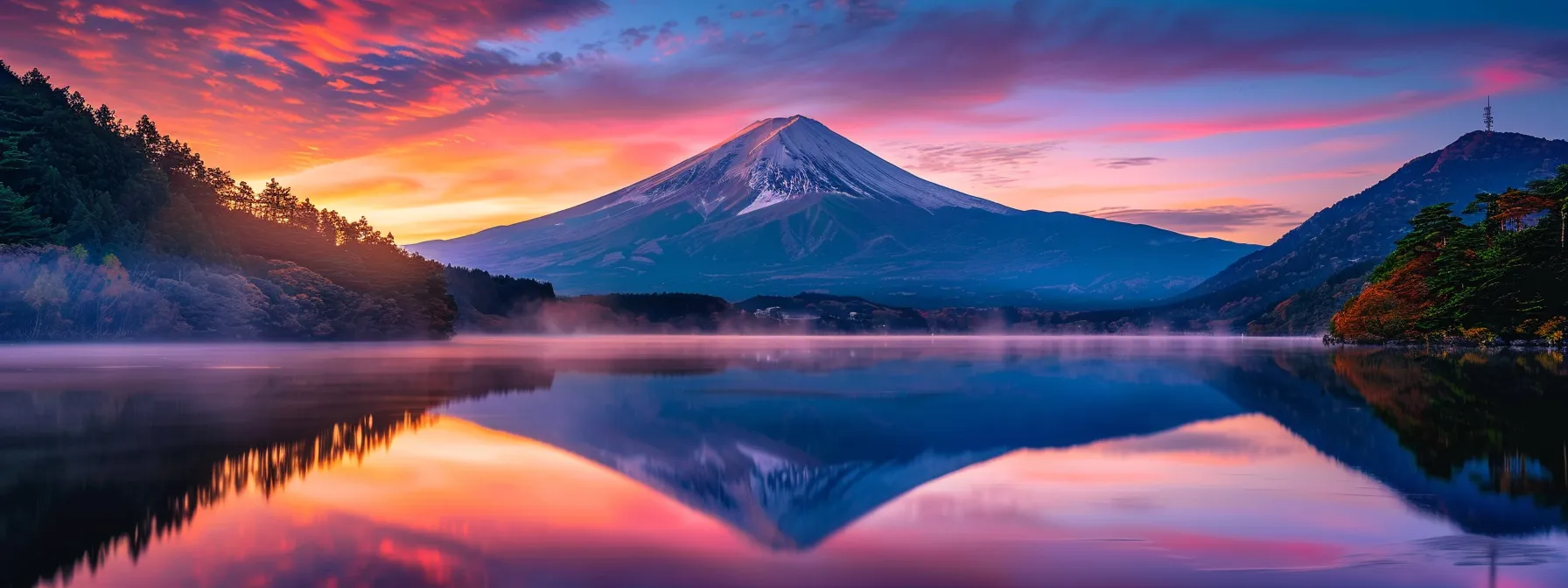 a majestic sunrise illuminates a tranquil mountain lake, the vivid reflections of towering peaks creating a serene and harmonious atmosphere.
