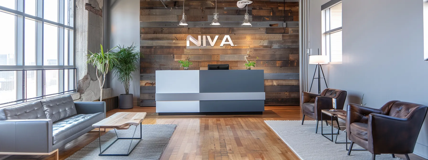 a sleek, modern office environment showcases a large interactive screen displaying nieva, inc.'s well-organized website, emphasizing clean lines, professional aesthetics, and intuitive navigation, reflecting their commitment to accessibility and community engagement in real estate.